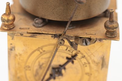Lot 1301 - AN EARLY 17TH CENTURY GERMAN GILT CASED STRIKING TABLE CLOCK
