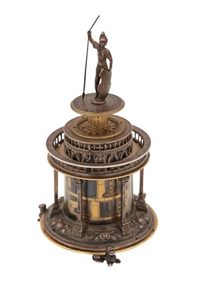 Lot 1243 - AN EARLY 17TH CENTURY SILVER AND GILT PENDULE A CERCLES TOURNANTS CLOCK WITH FIGURAL FINIAL