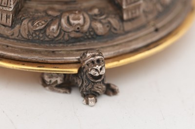 Lot 1243 - AN EARLY 17TH CENTURY SILVER AND GILT PENDULE A CERCLES TOURNANTS CLOCK WITH FIGURAL FINIAL
