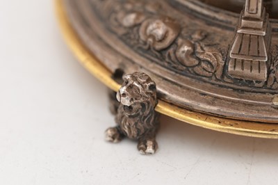 Lot 1243 - AN EARLY 17TH CENTURY SILVER AND GILT PENDULE A CERCLES TOURNANTS CLOCK WITH FIGURAL FINIAL