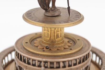 Lot 1243 - AN EARLY 17TH CENTURY SILVER AND GILT PENDULE A CERCLES TOURNANTS CLOCK WITH FIGURAL FINIAL