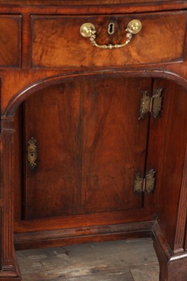 Lot 1484 - A GEORGE III FLAMED MAHOGANY SERPENTINE FRONTED KNEEHOLE DESK