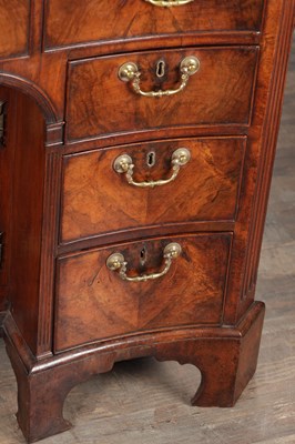 Lot 1484 - A GEORGE III FLAMED MAHOGANY SERPENTINE FRONTED KNEEHOLE DESK