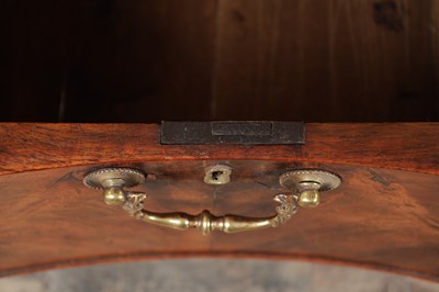 Lot 1484 - A GEORGE III FLAMED MAHOGANY SERPENTINE FRONTED KNEEHOLE DESK