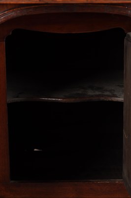 Lot 1484 - A GEORGE III FLAMED MAHOGANY SERPENTINE FRONTED KNEEHOLE DESK