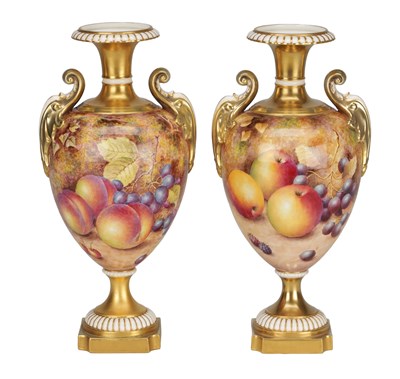 Lot 593 - FREEMAN A PAIR OF 1969 ROYAL WORCESTER PORCELAIN FRUIT-PAINTED CABINET VASES
