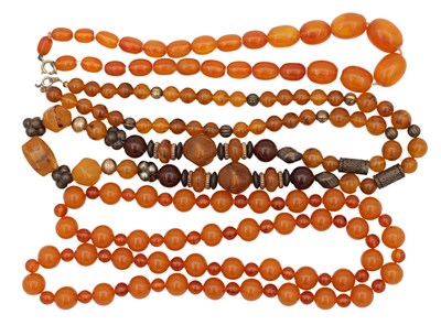 Lot 213 - A COLLECTION OF THREE AMBER BEAD NECKLACES