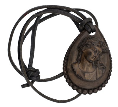 Lot 310 - A VICTORIAN VULCANITE CAMEO PENDANT