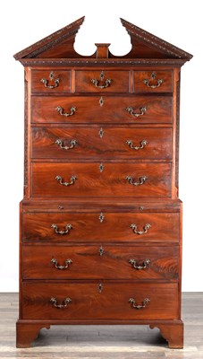 Lot 1658 - A GEORGE III MAHOGANY CHEST ON CHEST WITH ARCHITECTURAL PEDIMENT