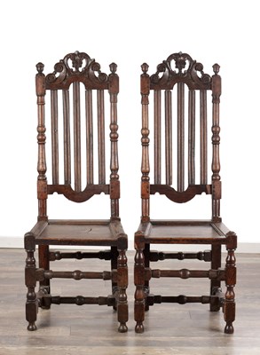 Lot 1558 - A PAIR OF 17TH CENTURY ENGLISH OAK HALL CHAIRS