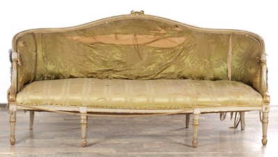 Lot 1584 - A GEORGE III PARCEL GILT AND PAINTED HEPPLEWHITE STYLE THREE SEATER SETTEE