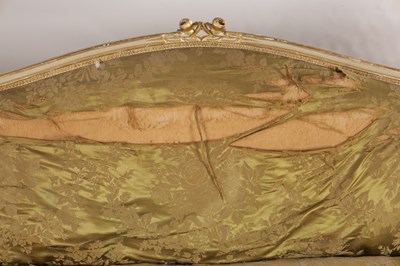 Lot 1584 - A GEORGE III PARCEL GILT AND PAINTED HEPPLEWHITE STYLE THREE SEATER SETTEE