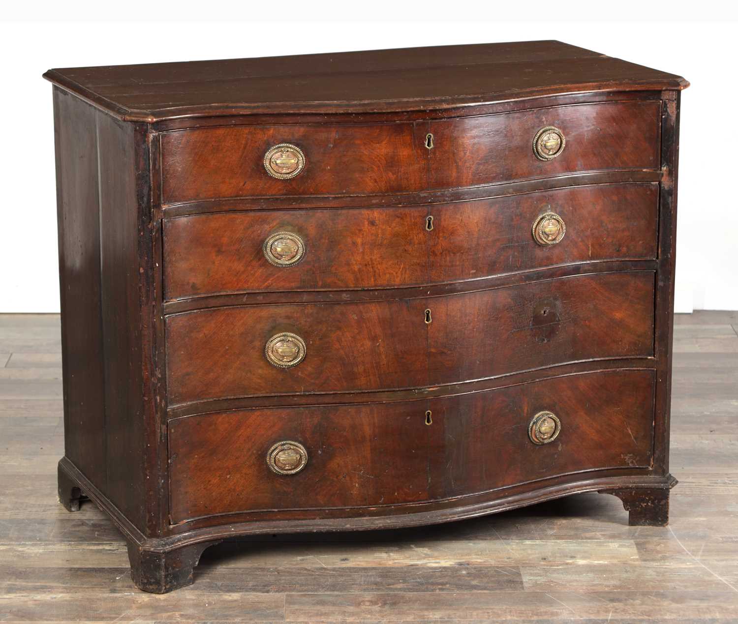 Lot 1569 - A GEORGE III MAHOGANY GENTLEMAN'S SERPENTINE FRONT DRESSING CHEST