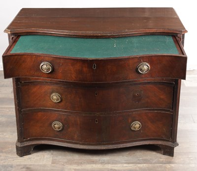 Lot 1569 - A GEORGE III MAHOGANY GENTLEMAN'S SERPENTINE FRONT DRESSING CHEST