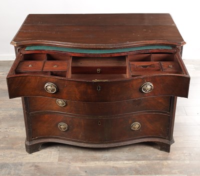 Lot 1569 - A GEORGE III MAHOGANY GENTLEMAN'S SERPENTINE FRONT DRESSING CHEST