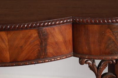 Lot 1615 - A GEORGE III FIGURED MAHOGANY SERPENTINE SERVING TABLE