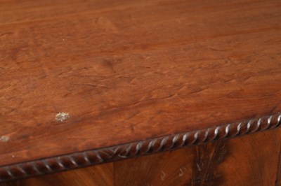 Lot 1615 - A GEORGE III FIGURED MAHOGANY SERPENTINE SERVING TABLE