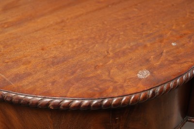 Lot 1615 - A GEORGE III FIGURED MAHOGANY SERPENTINE SERVING TABLE