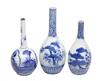 Lot 761 - A COLLECTION OF THREE JAPANESE BLUE AND WHITE PORCELAIN BOTTLE VASES
