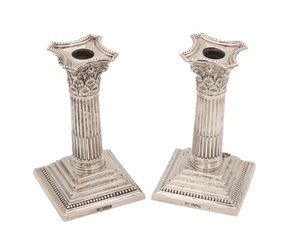 Lot 97 - A PAIR OF LATE VICTORIAN ENGLISH SILVER CANDLESTICKS