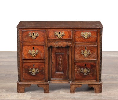 Lot 1556 - A MINIATURE GEORGE III MAHOGANY KNEEHOLE DESK