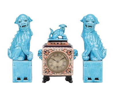 Lot 628 - A THREE PIECE EARLY 20TH CENTURY TURQUOISE-GLAZED CERAMIC CLOCK GARNITURE