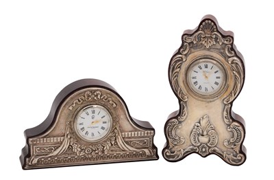 Lot 102 - TWO ENGLISH SILVER MOUNTED MINIATURE MANTEL CLOCKS
