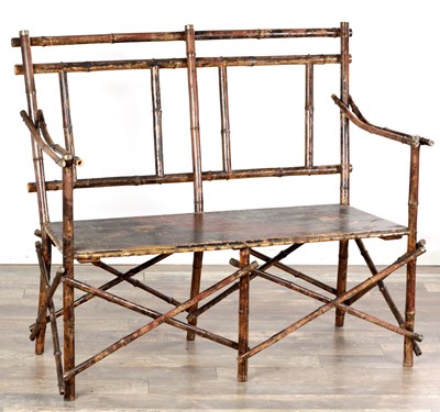 Lot 1557 - A LATE 19TH CENTURY BAMBOO TWO-SEATER SETTEE