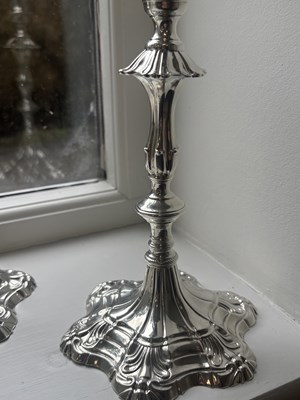Lot 19 - A FINE PAIR OF GEORGE III ENGLISH CAST SILVER CANDLESTICKS BY EBENEZER COKER