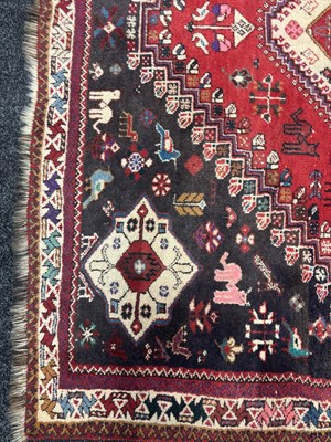 Lot 989 - A LARGE ANTIQUE PERSIAN WOOL CARPET