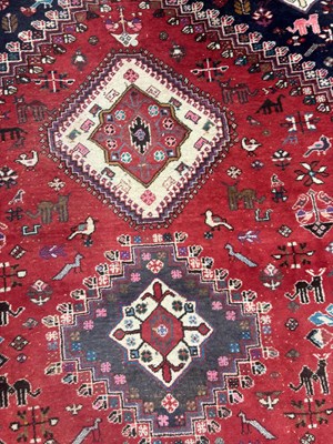 Lot 989 - A LARGE ANTIQUE PERSIAN WOOL CARPET