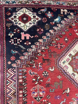 Lot 989 - A LARGE ANTIQUE PERSIAN WOOL CARPET