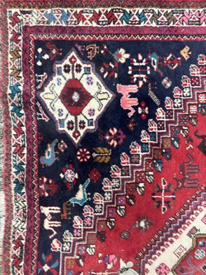 Lot 989 - A LARGE ANTIQUE PERSIAN WOOL CARPET