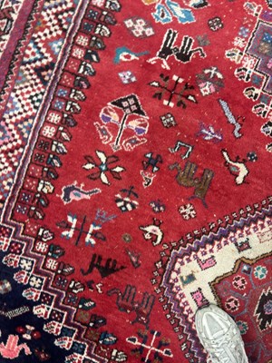 Lot 989 - A LARGE ANTIQUE PERSIAN WOOL CARPET