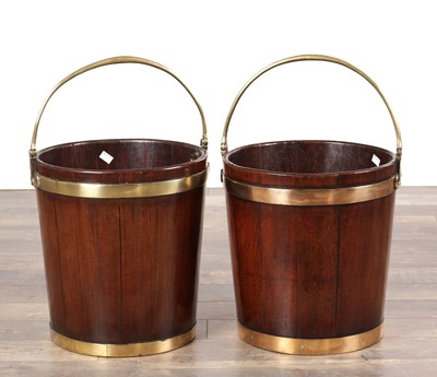 Lot 1519 - A PAIR OF GEORGE III MAHOGANY BRASS BOUND PEAT BUCKETS