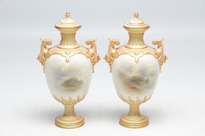 Lot 585 - JOHN STINTON. A FINE PAIR OF ROYAL WORCESTER PORCELAIN OVOID PEDESTAL CABINET VASES AND COVERS