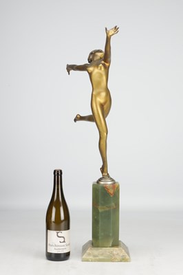 Lot 1136 - JOSEF LORENZL AN AUSTRIAN ART DECO GILT BRONZE FIGURE OF A NUDE DANCER ON GREEN ONYX BASE