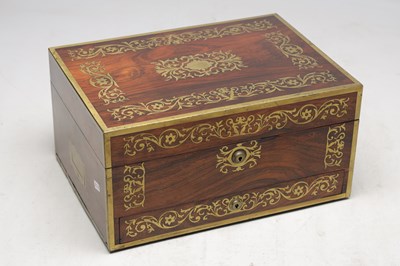 Lot 1386 - ASPREY OF LONDON A ROSEWOOD AND BRASS BOUND DRESSING CASE WITH SILVER GILT FITTINGS