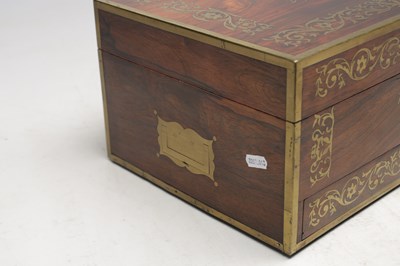 Lot 1386 - ASPREY OF LONDON A ROSEWOOD AND BRASS BOUND DRESSING CASE WITH SILVER GILT FITTINGS
