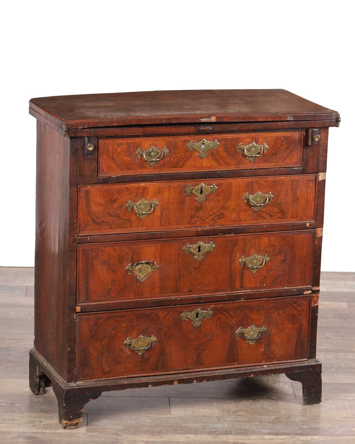 Lot 1606 - AN EARLY 18TH CENTURY FIGURED WALNUT BACHELOR'S CHEST