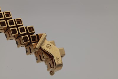 Lot 174 - AN 18CT YELLOW GOLD AND DIAMOND DOUBLE ROW BRACELET
