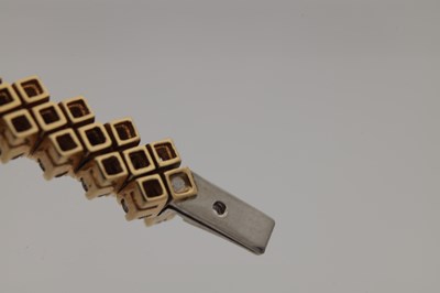 Lot 174 - AN 18CT YELLOW GOLD AND DIAMOND DOUBLE ROW BRACELET