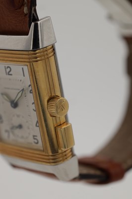 Lot 478 - A CIRCA 2000 JAEGER-LECOULTRE STEEL AND GOLD REVERSO MEMORY WRIST WATCH