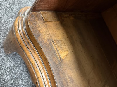 Lot 1515 - AN UNUSUAL GEORGE III STYLE MAHOGANY SERPENTINE CHEST OF DRAWERS WITH BRUSHING SLIDE