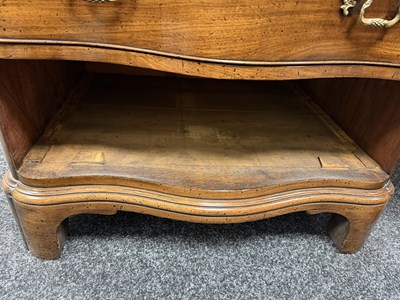 Lot 1515 - AN UNUSUAL GEORGE III STYLE MAHOGANY SERPENTINE CHEST OF DRAWERS WITH BRUSHING SLIDE