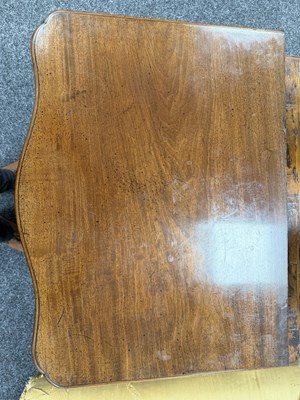 Lot 1515 - AN UNUSUAL GEORGE III STYLE MAHOGANY SERPENTINE CHEST OF DRAWERS WITH BRUSHING SLIDE