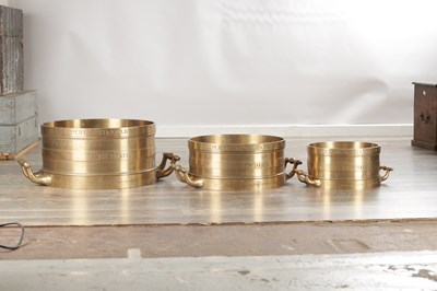 Lot 1022 - A SET OF THREE IMPERIAL STANDARD BELL METAL COUNTY MEASURES BY J. M'EWAN, LONDON AND MELBOURNE