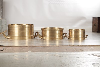 Lot 1022 - A SET OF THREE IMPERIAL STANDARD BELL METAL COUNTY MEASURES BY J. M'EWAN, LONDON AND MELBOURNE
