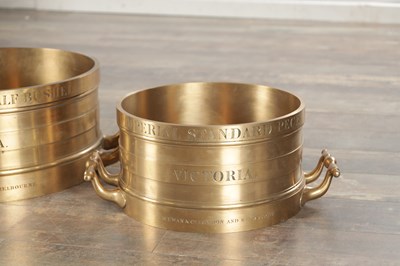Lot 1022 - A SET OF THREE IMPERIAL STANDARD BELL METAL COUNTY MEASURES BY J. M'EWAN, LONDON AND MELBOURNE