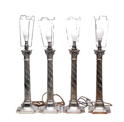 Lot 57 - A SET OF FOUR LATE 20TH CENTURY ENGLISH SILVER CORINTHIAN COLUMN TABLE LAMPS